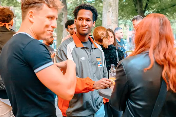 Locals and internationals meeting for the first time on the terrace at the SMP social in Hamburg