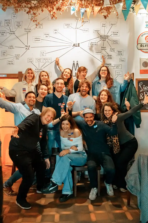 Guests laughing together at a Social Melting Pot event